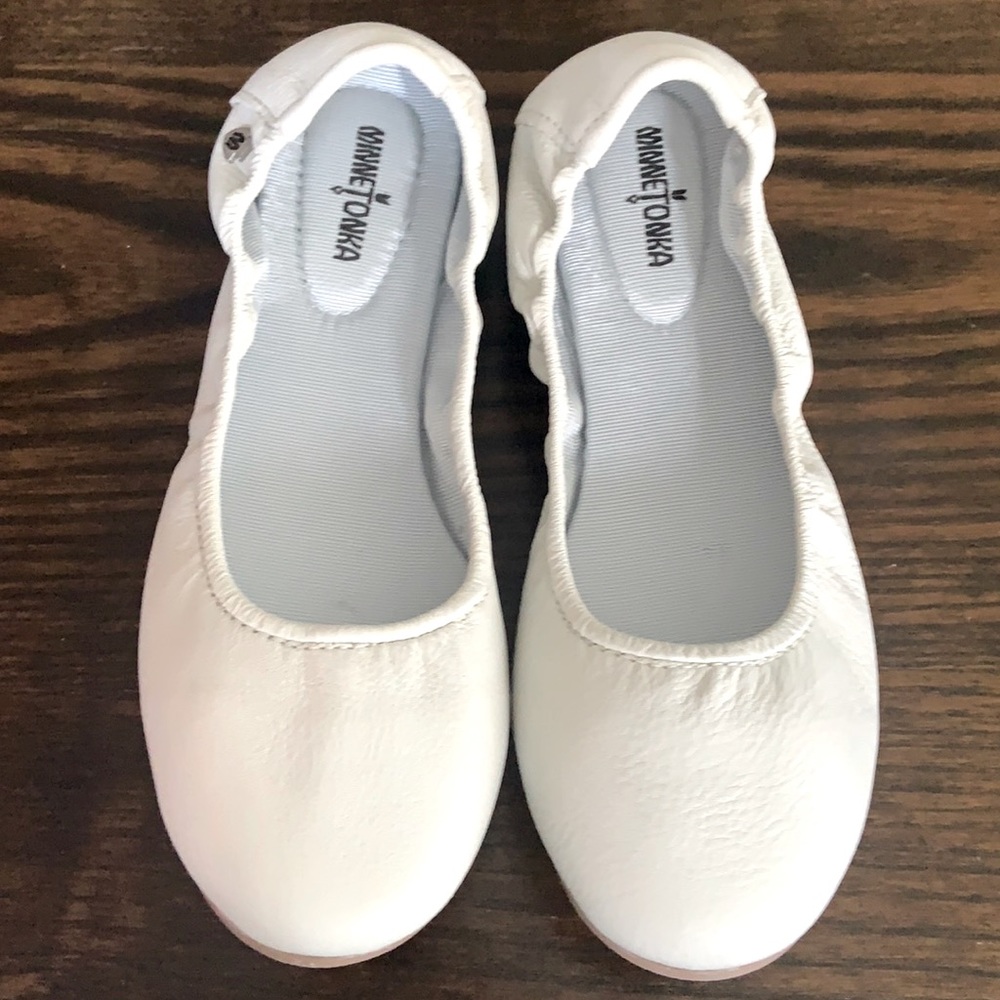 Brand new, never worn ballerina flats. Color is slightly off white.